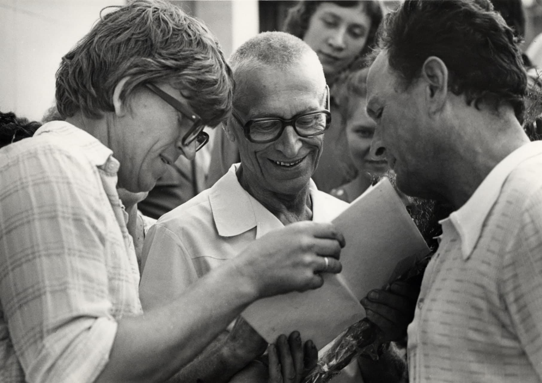 Mykola Amosov surrounded by colleagues